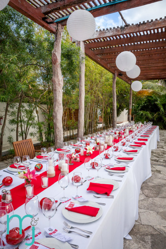 Long table with colorful place settings